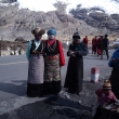 Tibetian women under the glacier